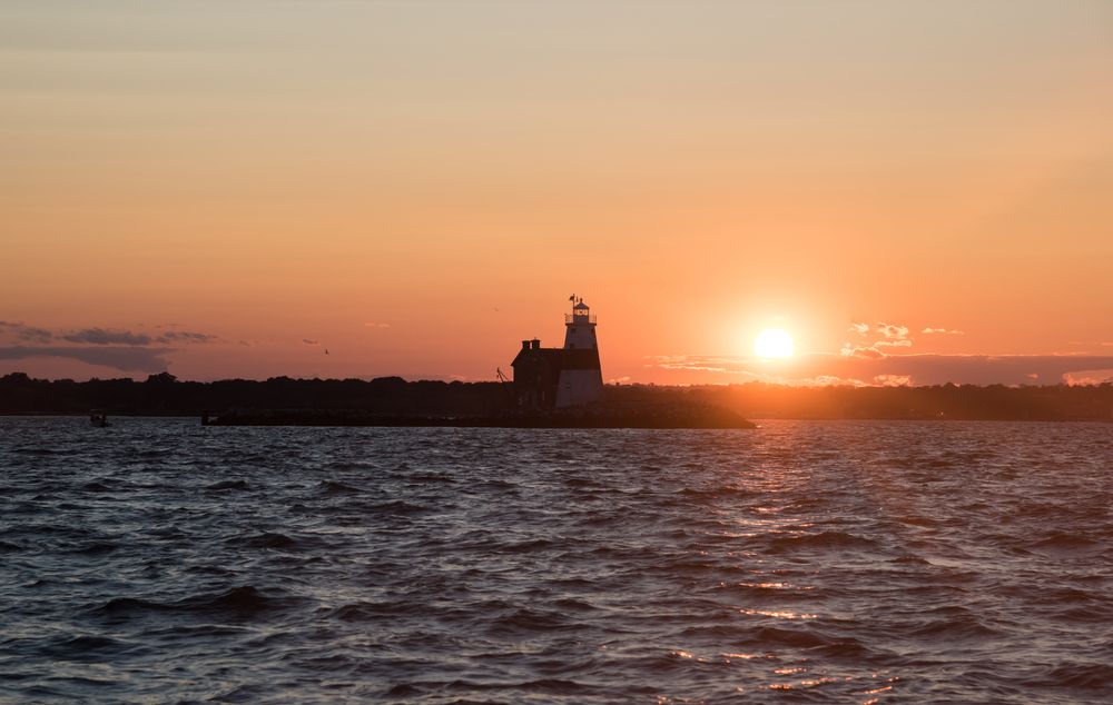 Silhouette of Execution Rocks Lighthouse during sunset