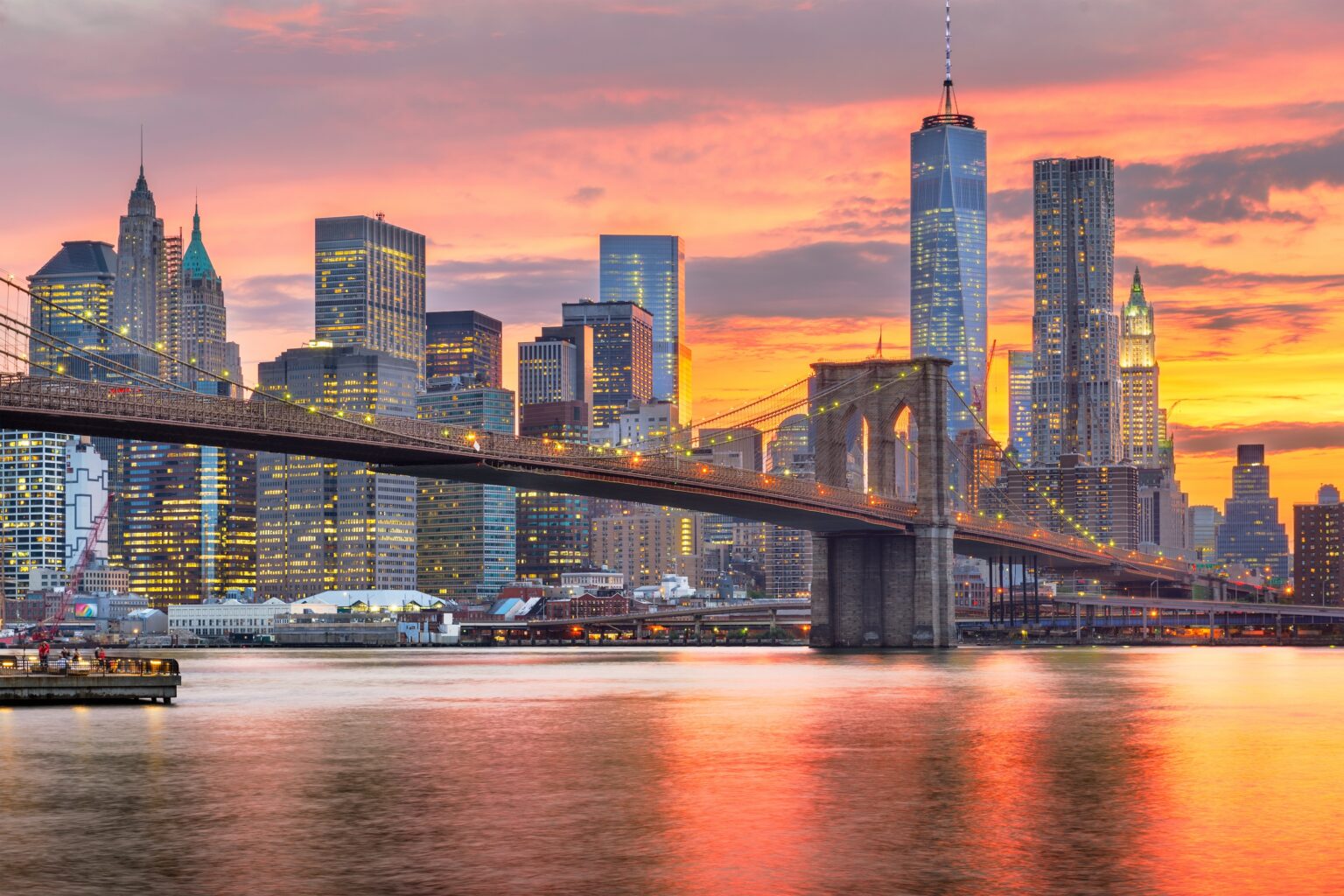 The Brooklyn Bridge and the Lower Manhattan skyline at sunset