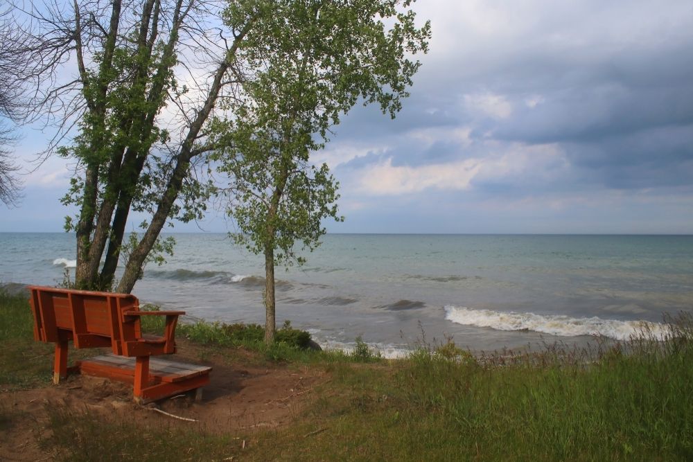 Bench overlooking the waters at Harrington Beach State Park