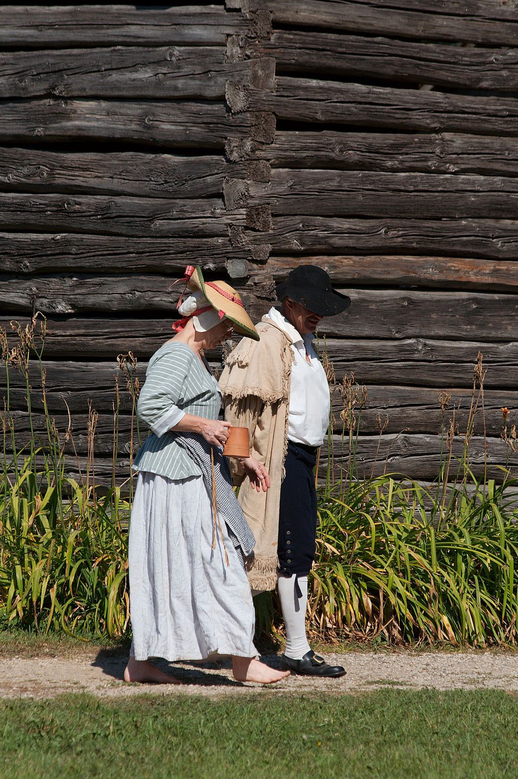 Actors walking along Ozaukee County Pioneer Village