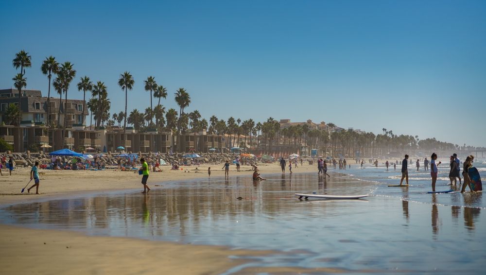 People enjoying the waters of Harbor Beach