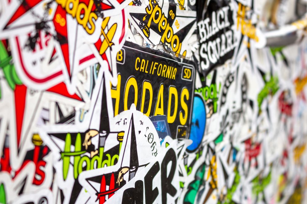 Closeup of something filled with hodad's stickers.