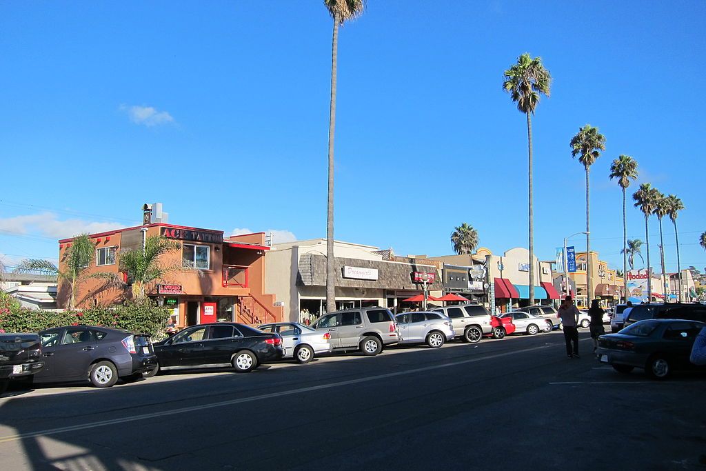 Cars parked near the sidewalks of newport avenue.