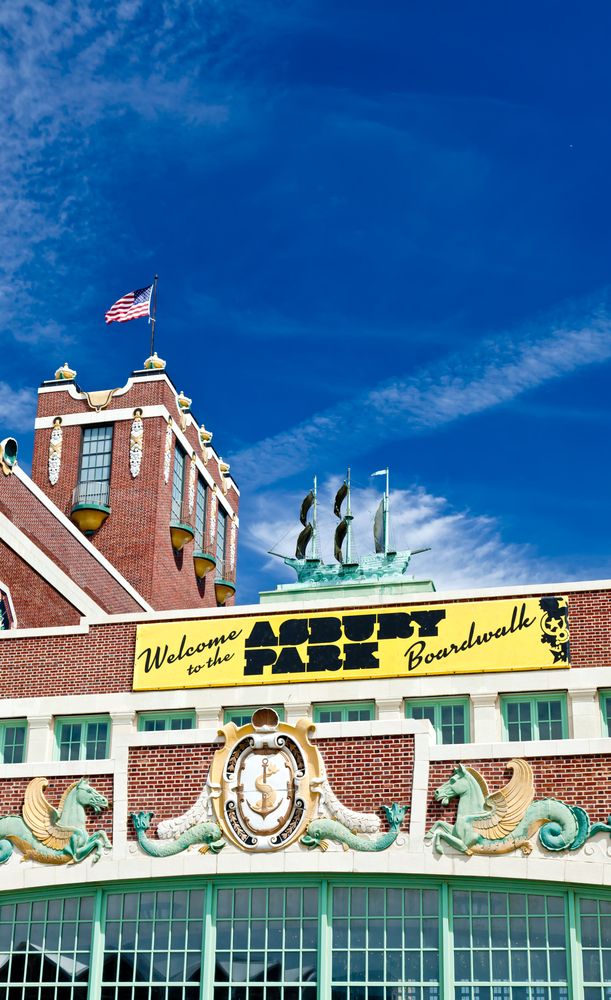 Welcome sign of Asbury Park Boardwalk on top of the convention hall