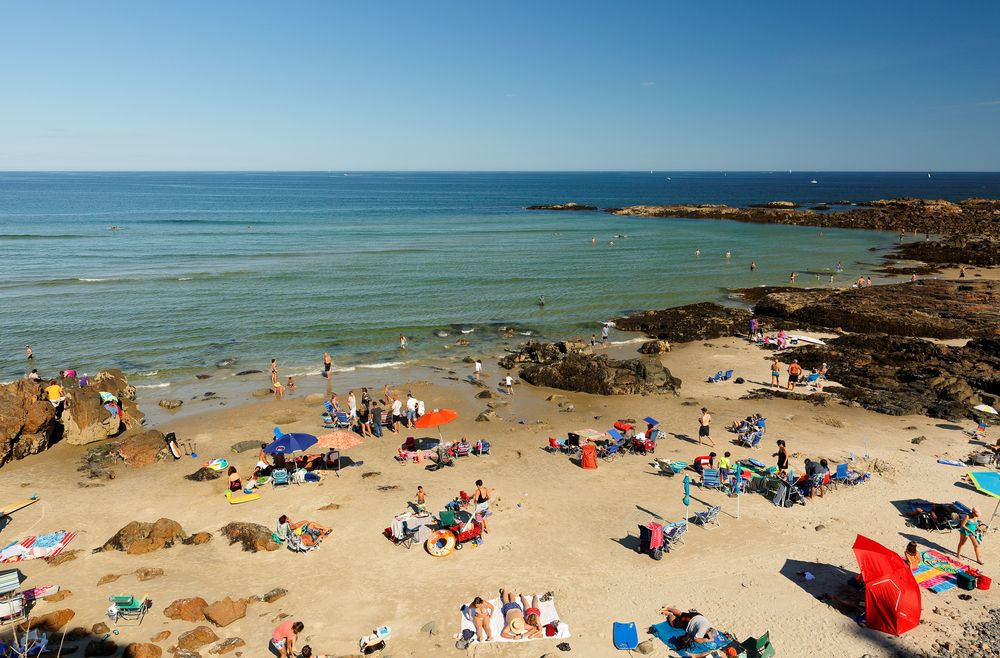 People enjoying the sun at Ogunquit Beach