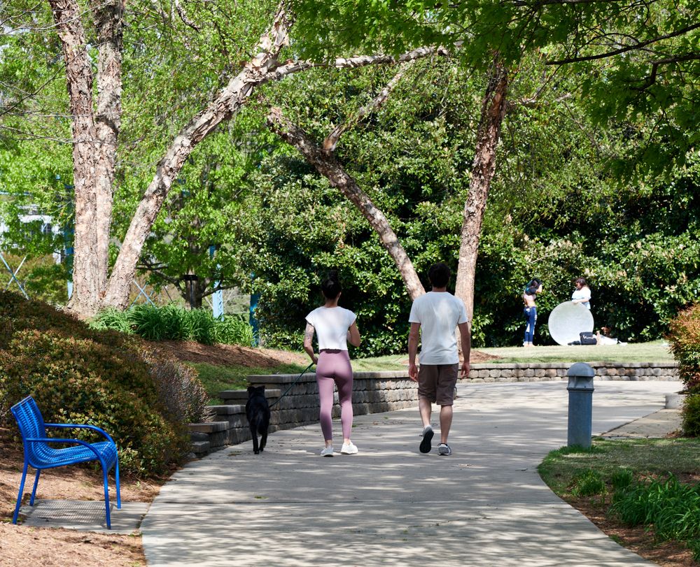 People walking along Coolidge Park