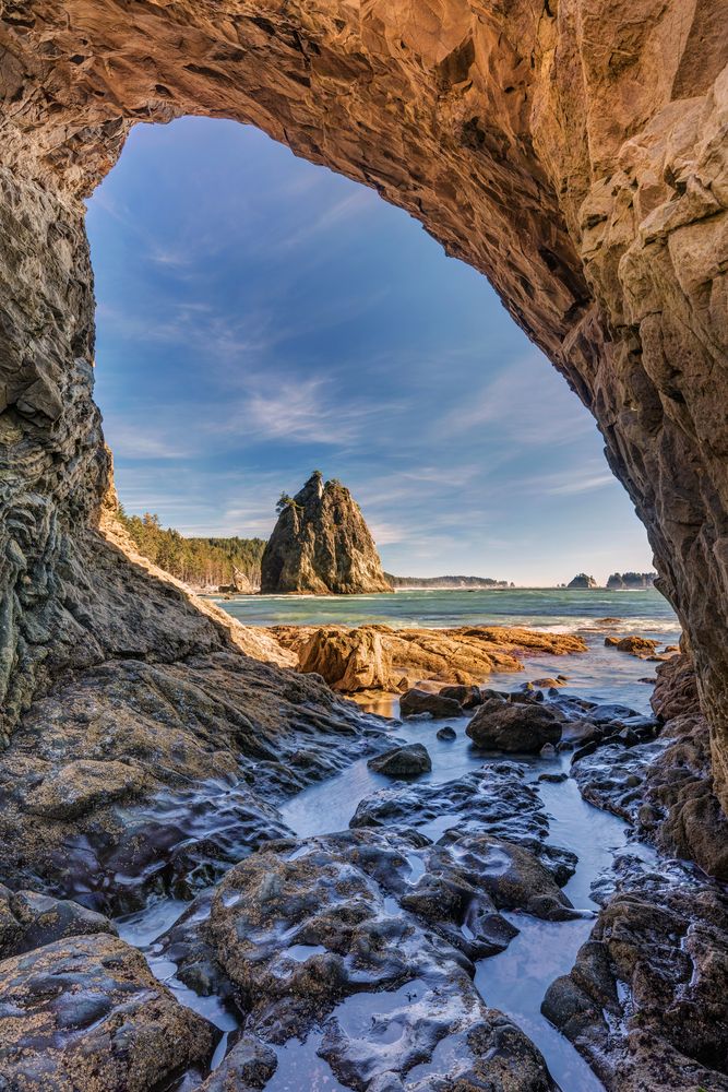View from under a stone arch at Rialto Beach