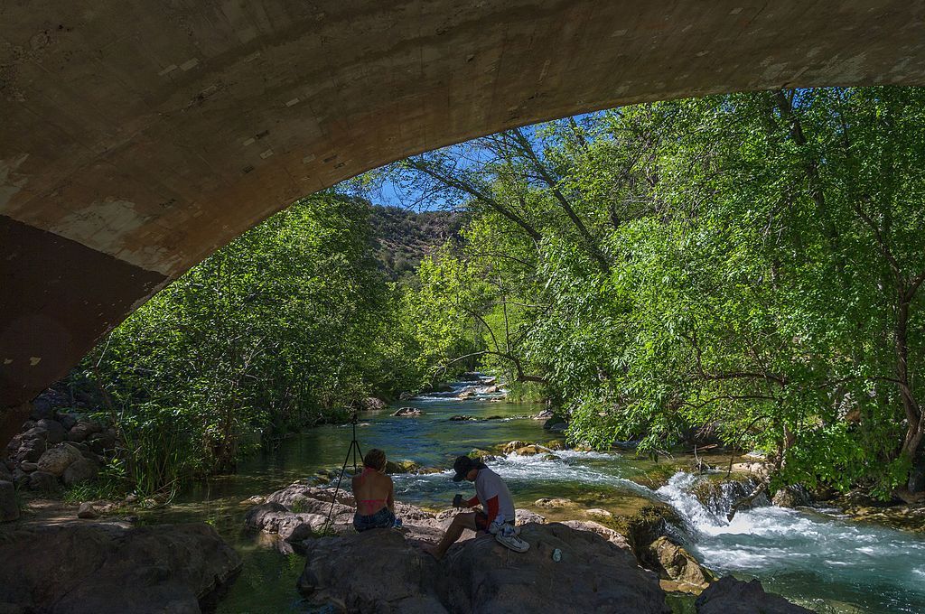 People under Fossil Creek bridge
