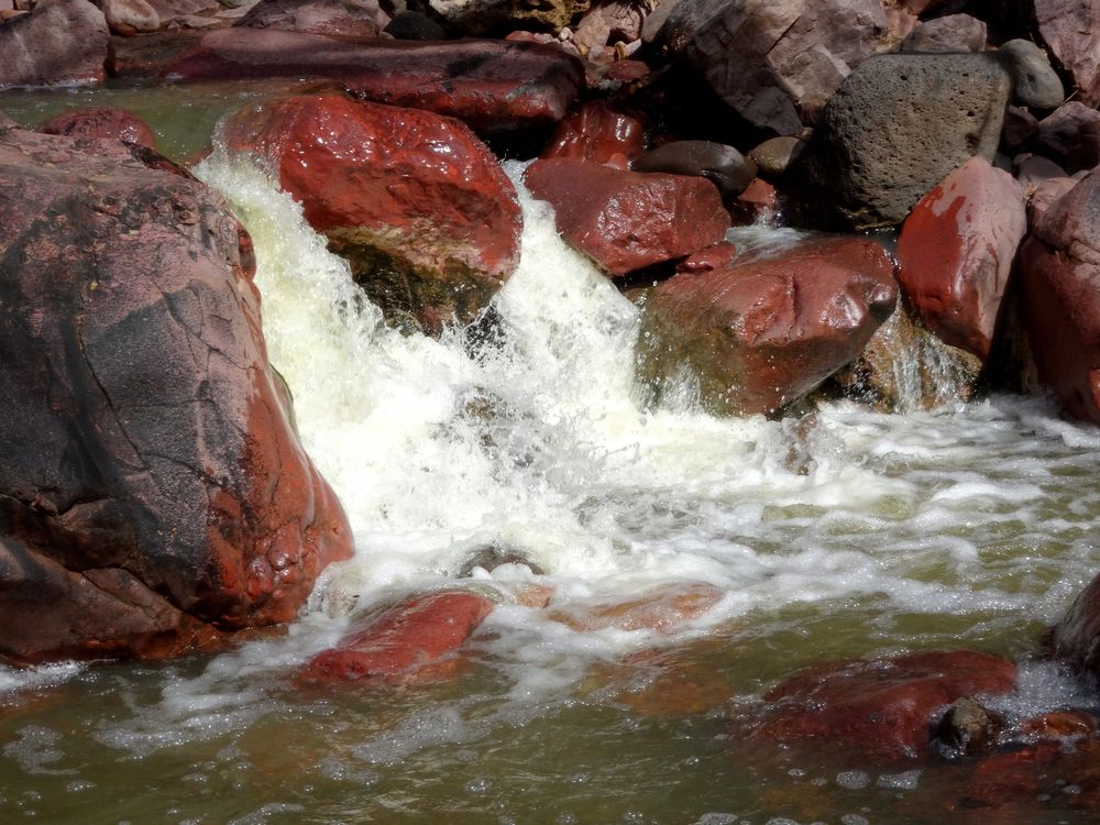 A waterfall under Tonto Natural Bridge
