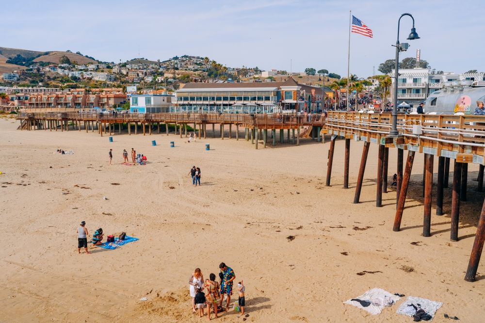 People enjoying the sun at Pismo City Beach