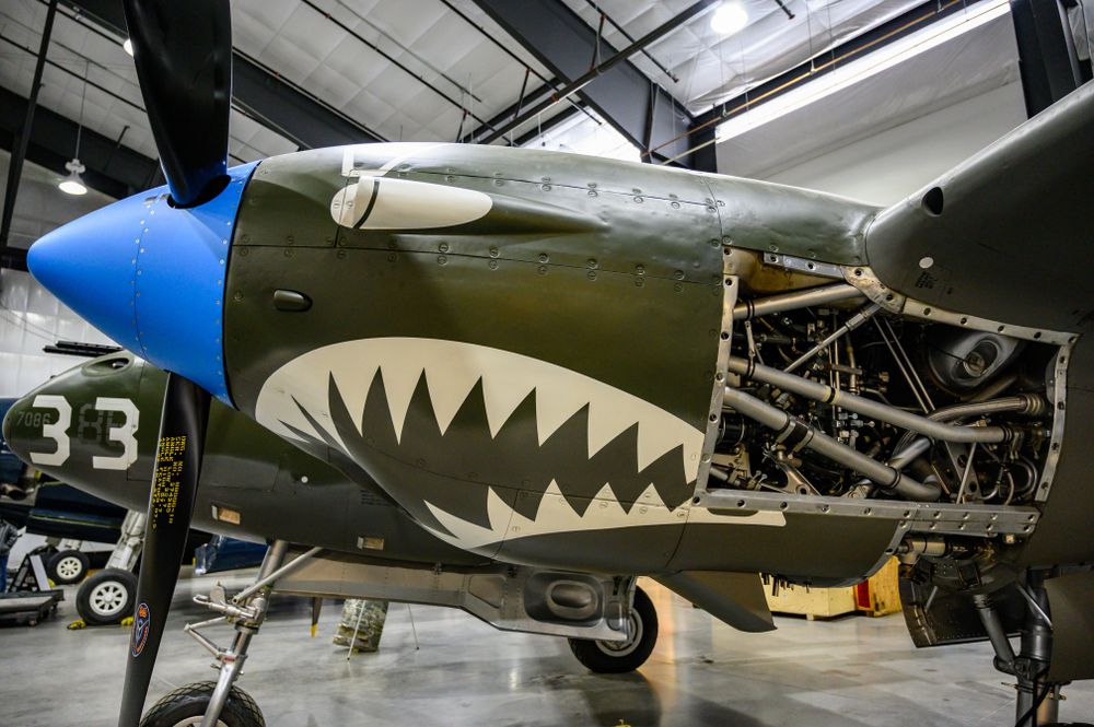 Exposed engine of an aircraft in National Museum of World War II Aviation