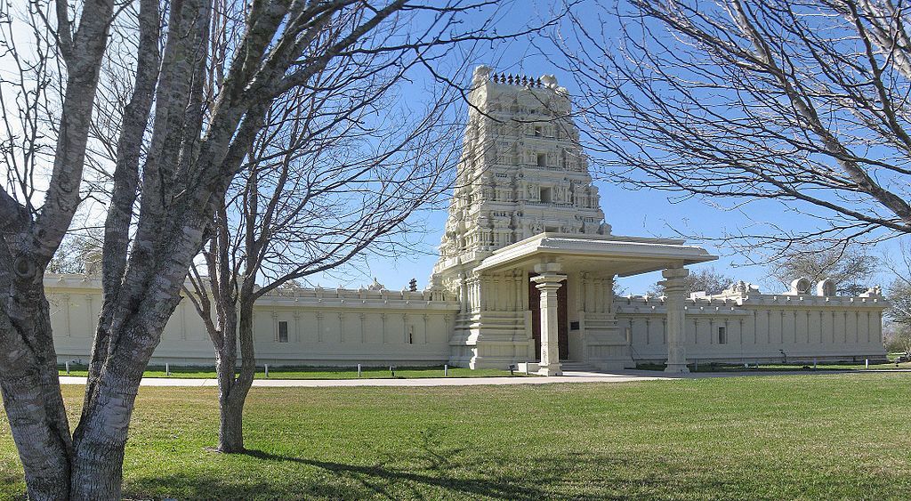 Sunny day view of the tall Sri Meenakshi temple.