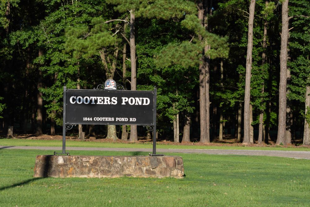 Road sign for Cooters Pond Park