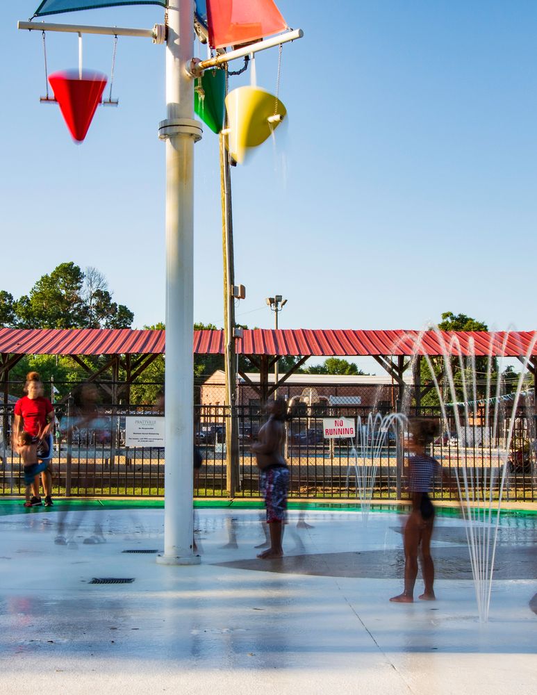 Children playing at Pratt Park's splash pad