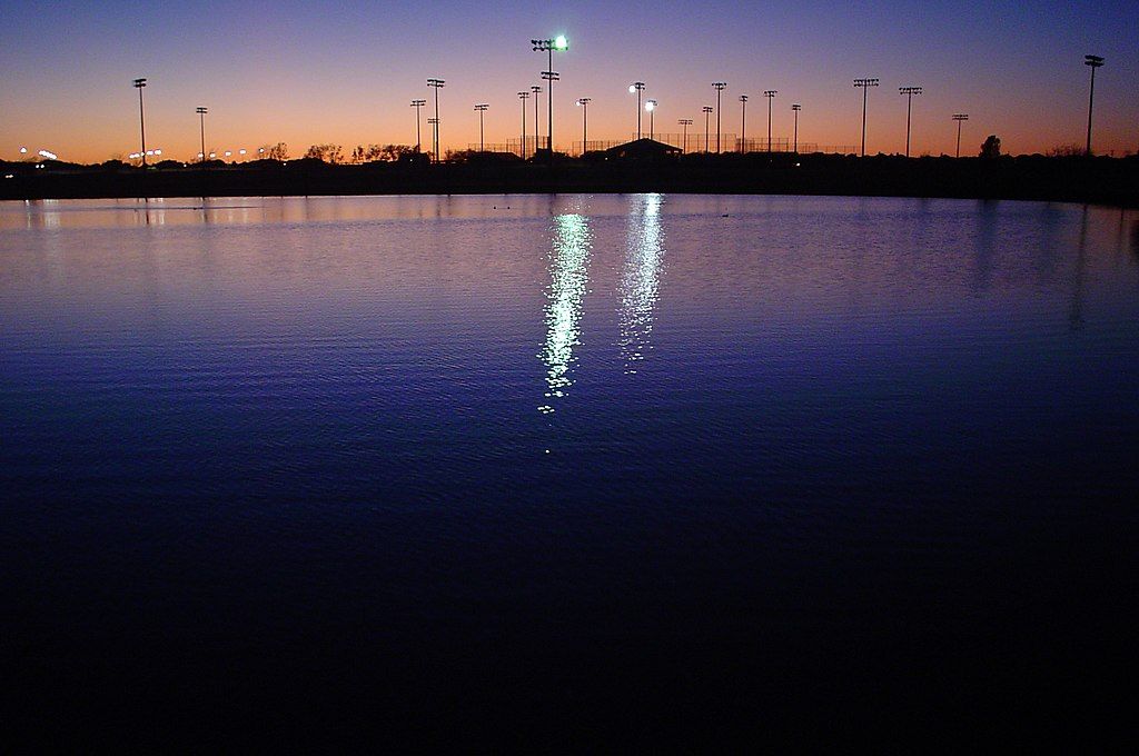 Sunset over Russell Creek Park's water
