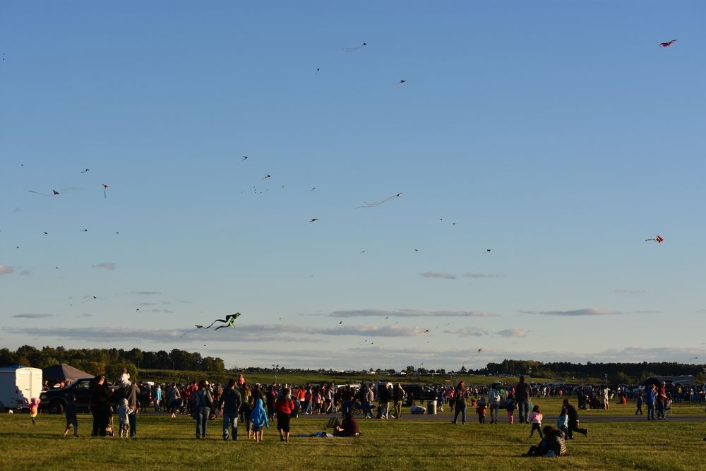 People admiring the hot air balloon launch at Adirondack Balloon Festival