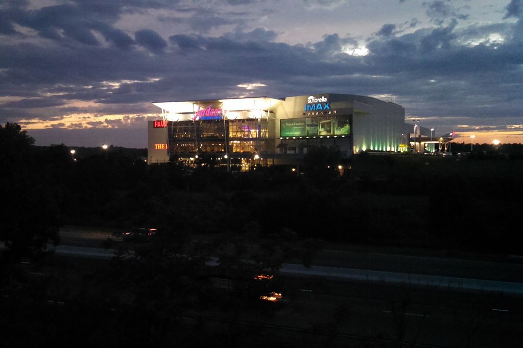 Night view of Sunbrella IMAX 3D Theater's exterior