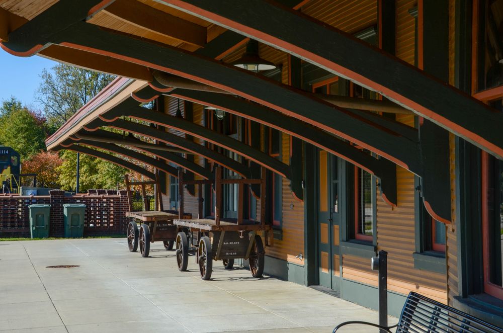Old carts beside the Hamlet Depot & Museums