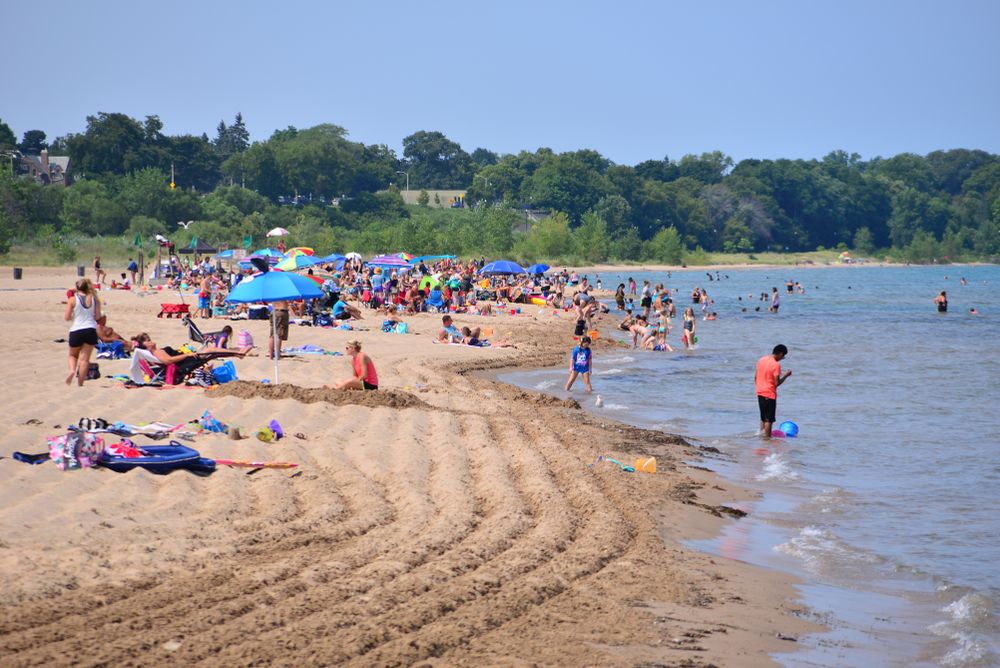 People enjoying the sun at Racine North Beach