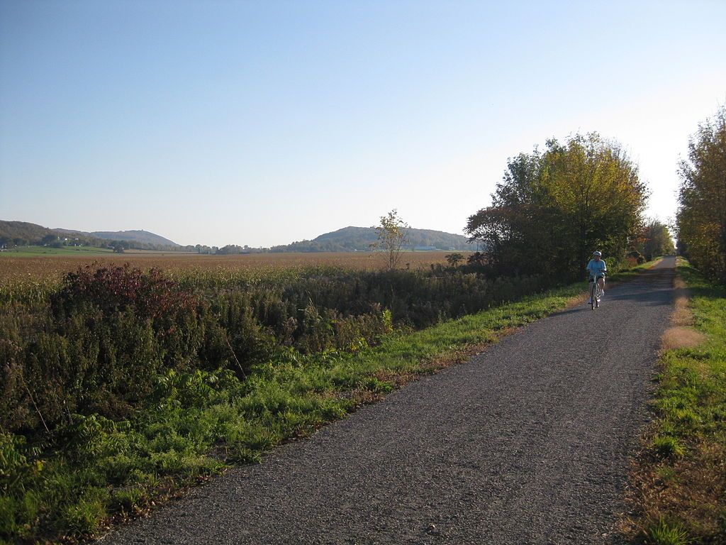 A person riding a bike along Missisquoi Valley Rail-Trail
