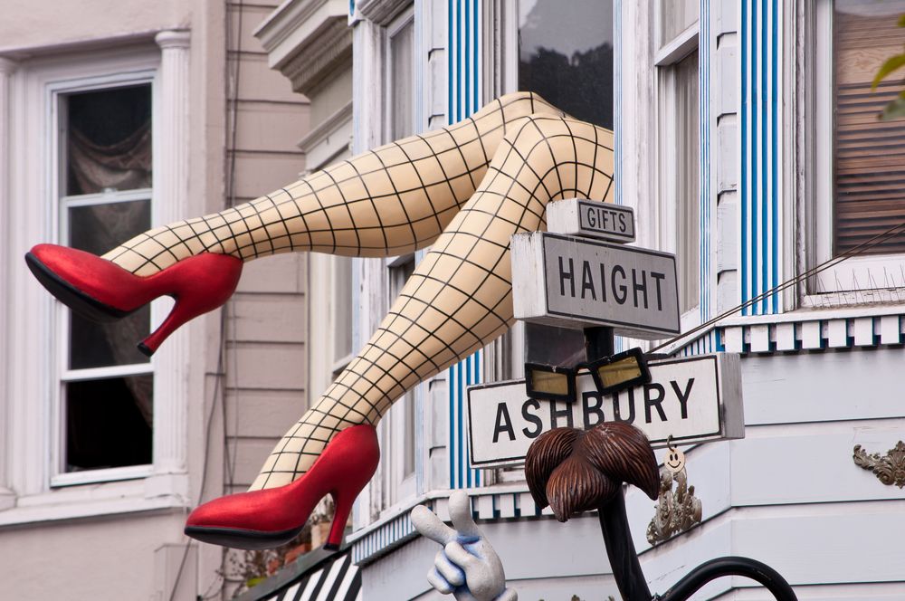 Iconic legs sticking out a window at Haight Street