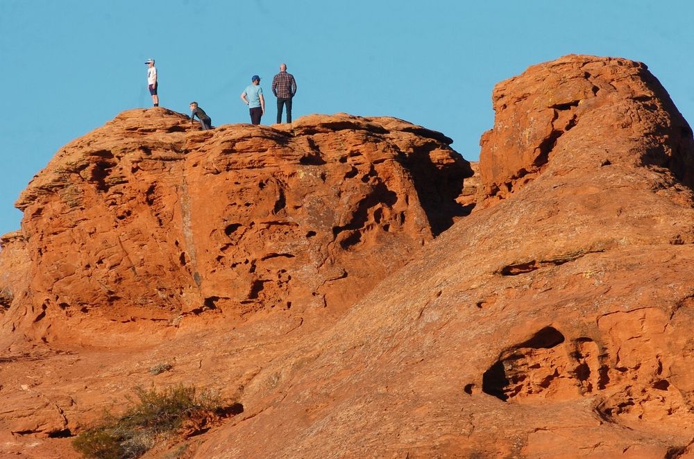 People on top of Dixie rock at Pioneer Park