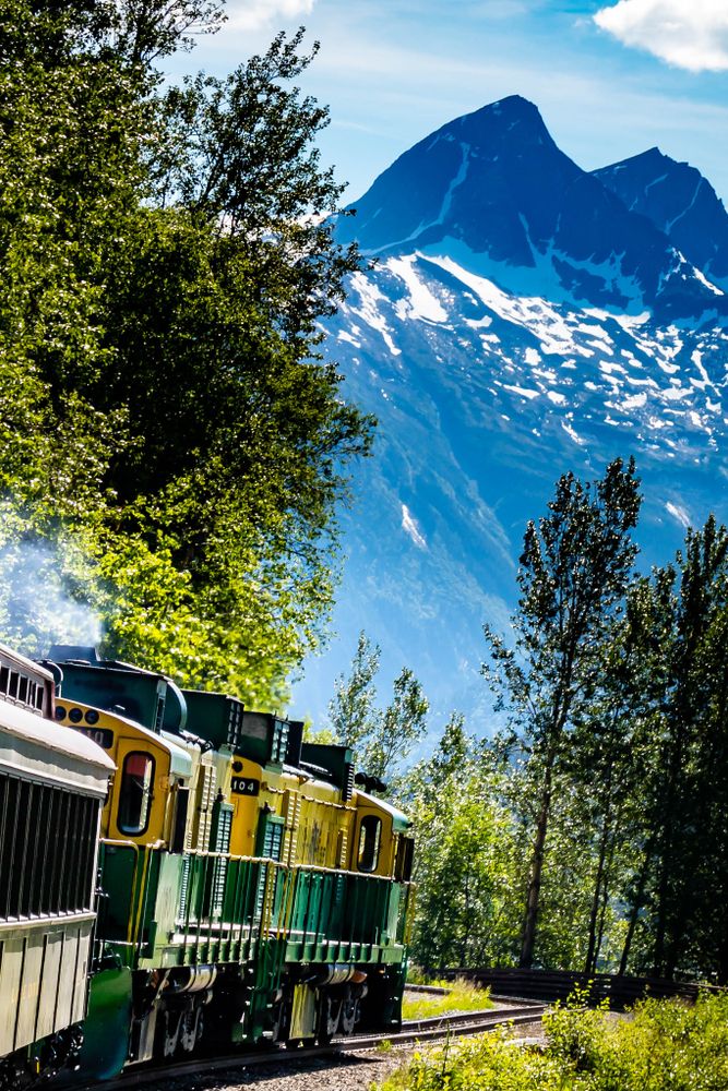 A yellow train of White Pass and Yukon Route