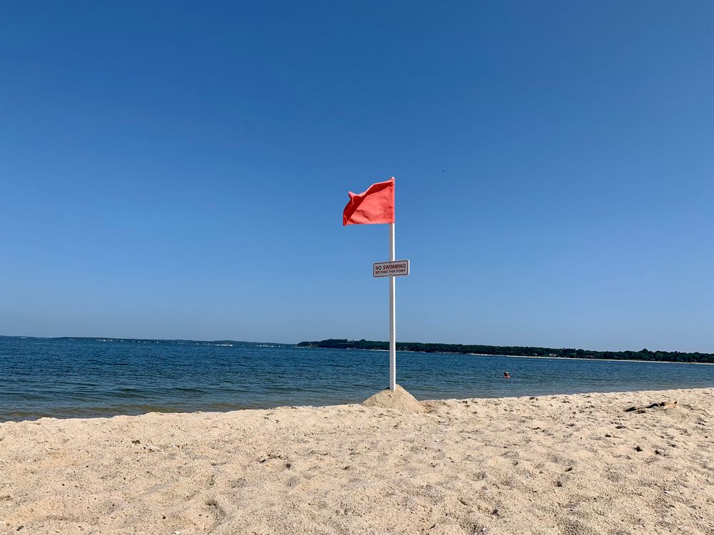 The sand and waters of Foster Memorial Beach