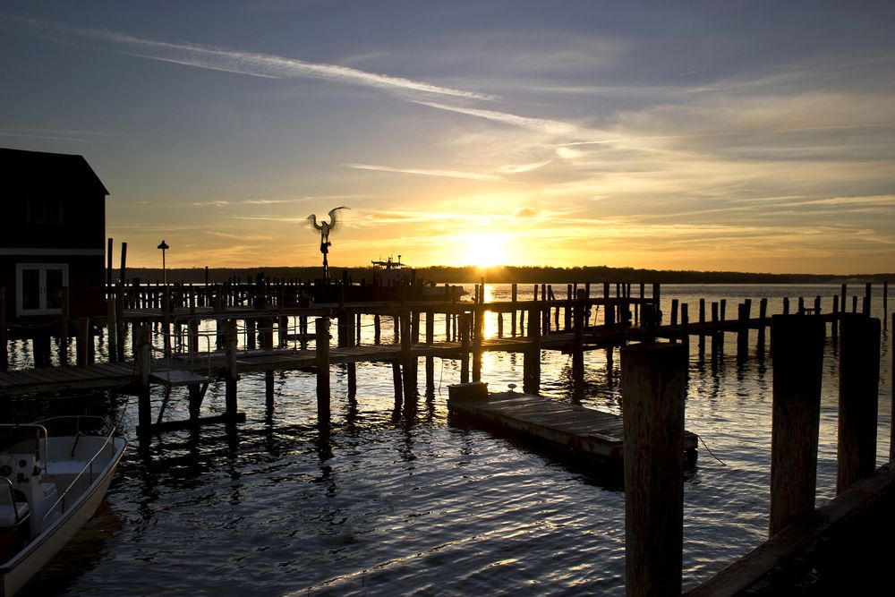 Sunrise over Greenport's marina