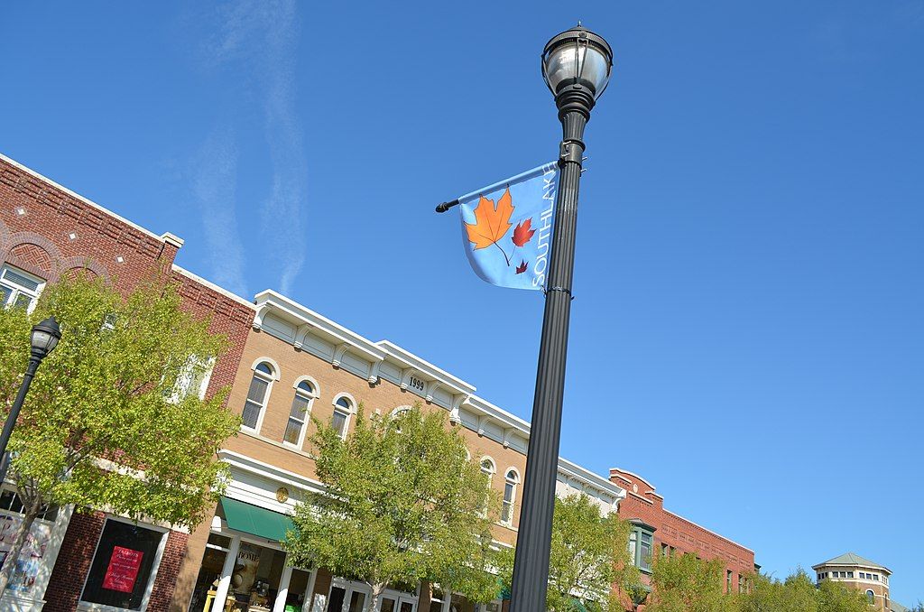A light post with a little southlake flag at town square