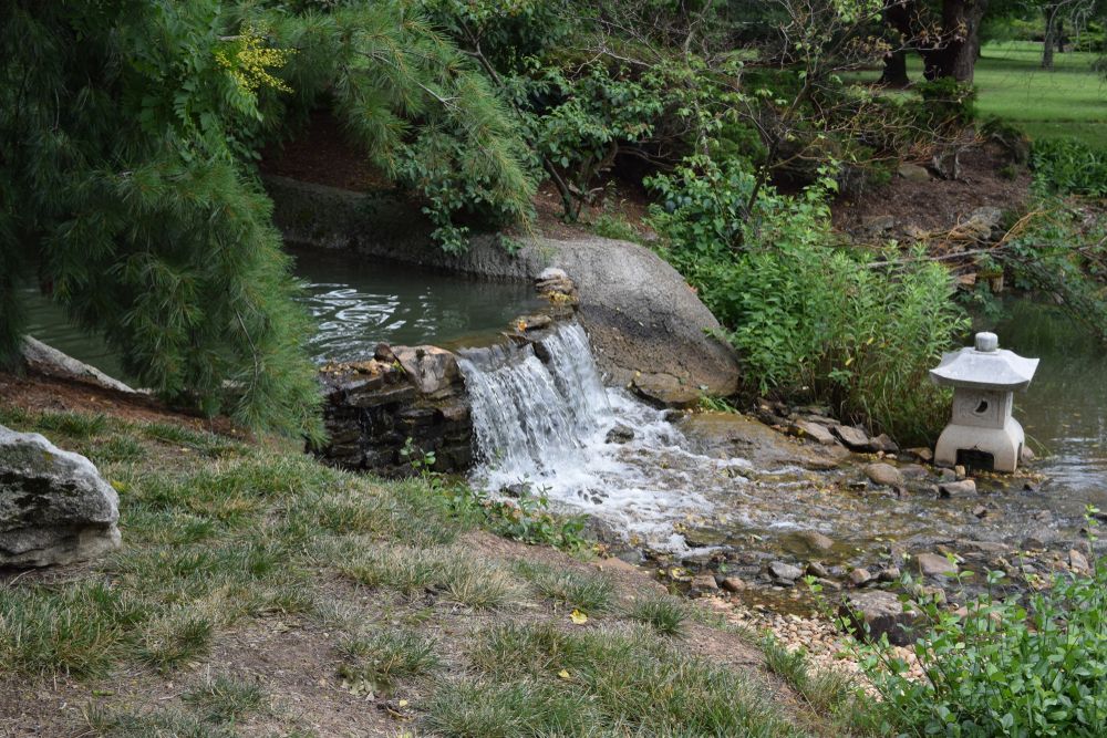 A small waterfall at Mizumoto Japanese Stroll Garden
