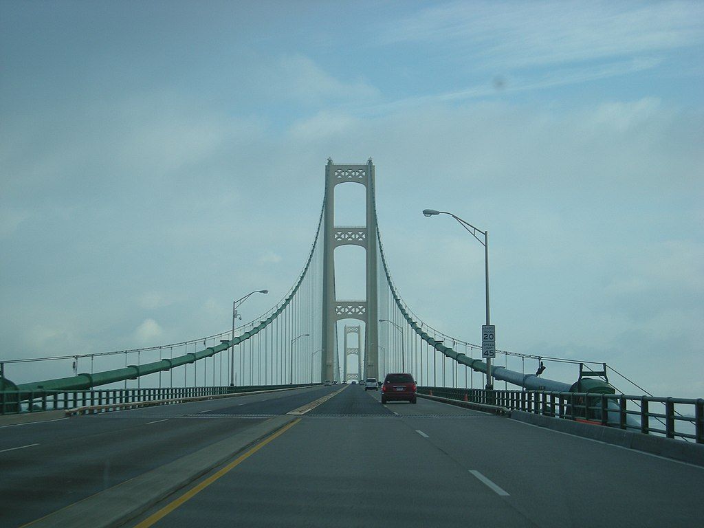 Cars along the road of Mackinac Bridge