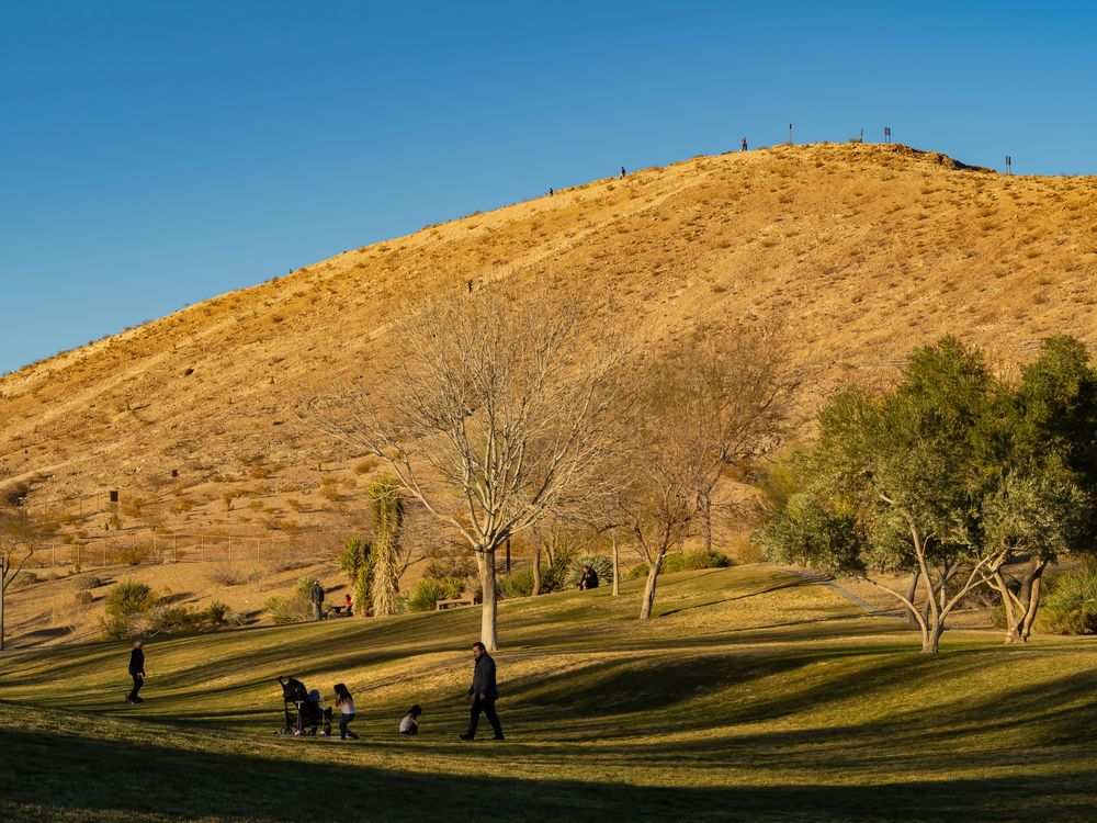 People walking along Exploration Peak Park