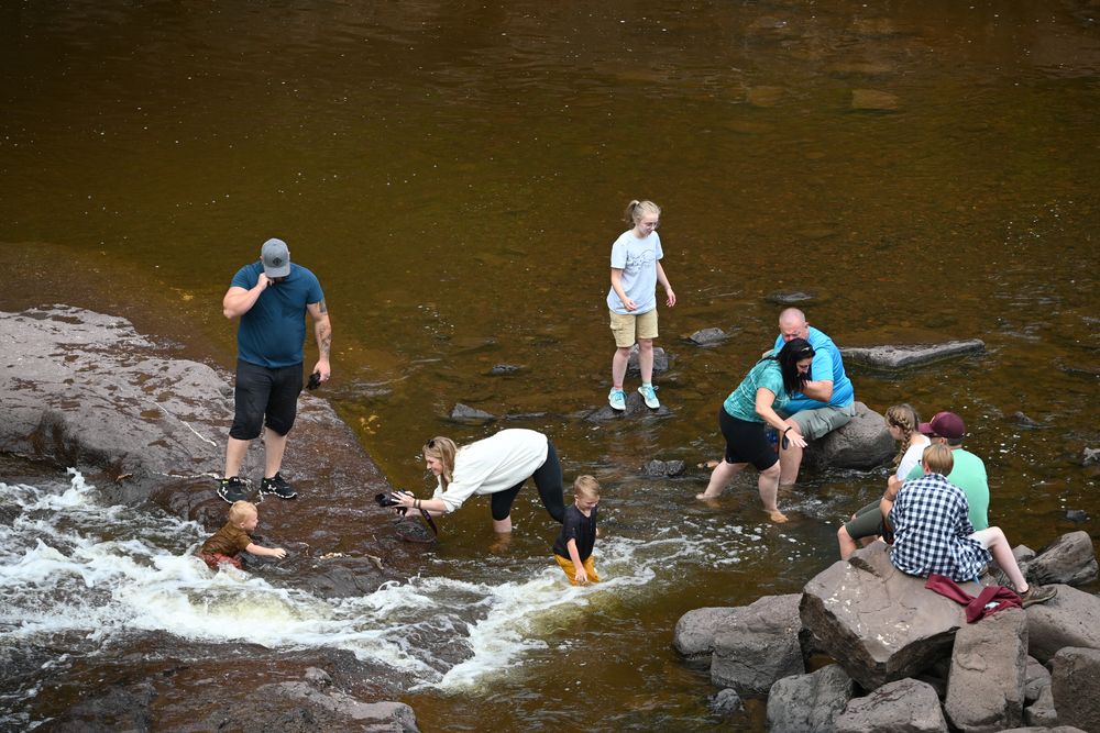 People swimming on Gooseberry Falls