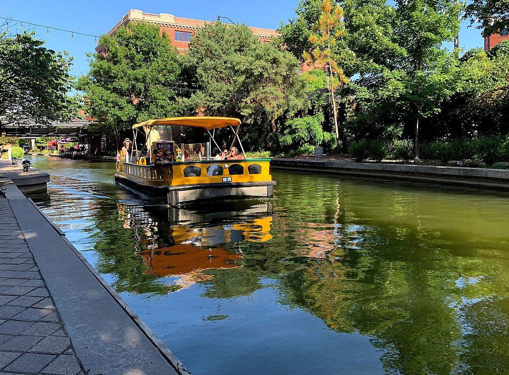 Tourists riding a Bricktown Water Taxi