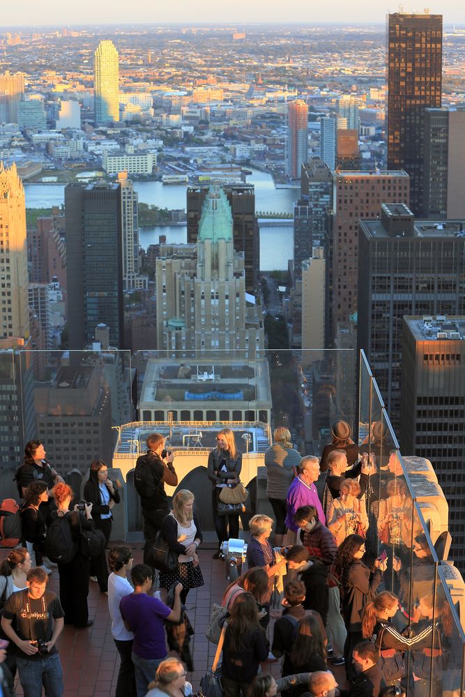 People admiring the view from Top of the Rock