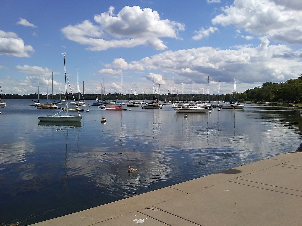 Boats on the water of Lake Harriet Park