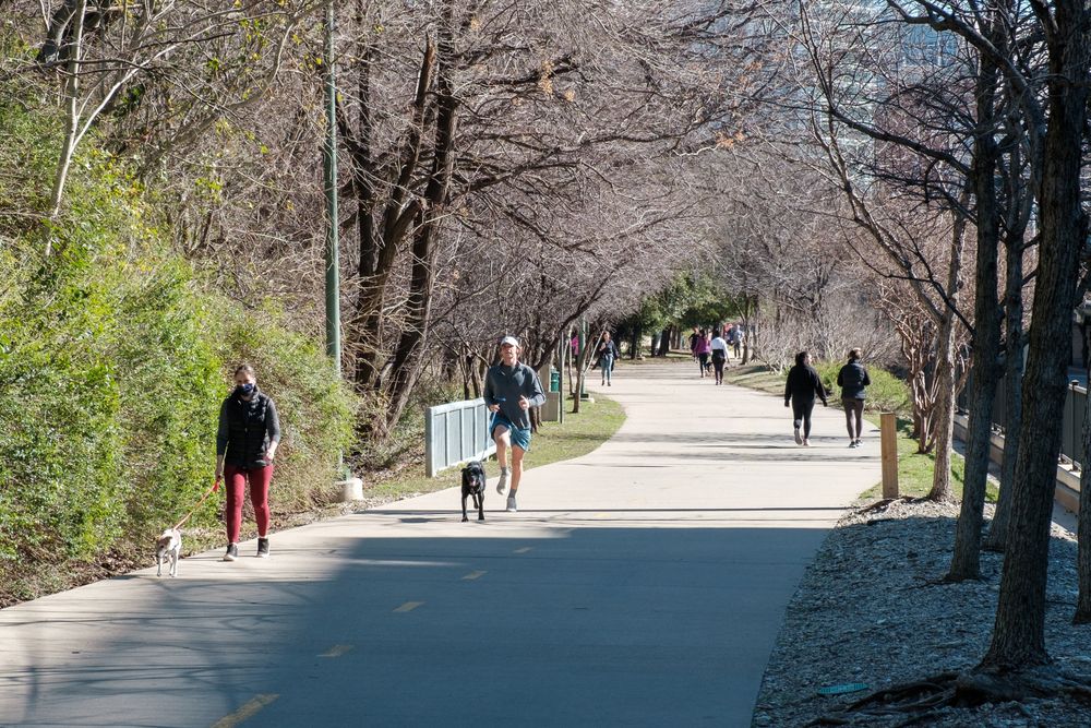 People walking along Katy Trail