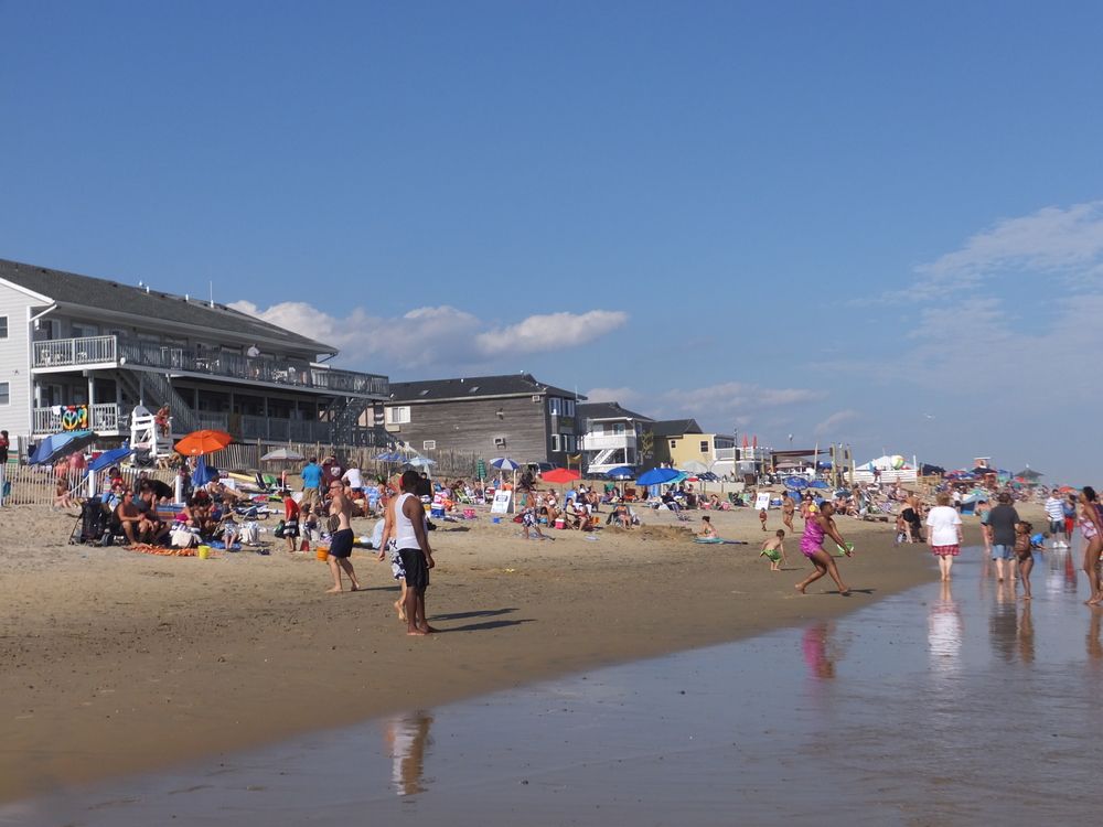 People enjoying the sun at Misquamicut State Beach