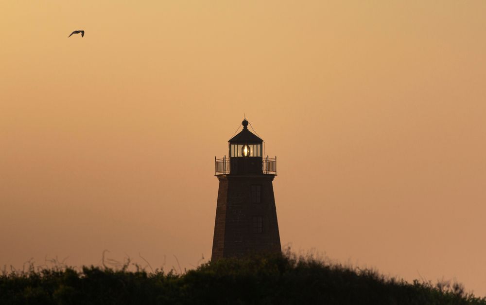 Silhouette of Point Judith Lighthouse during sunset
