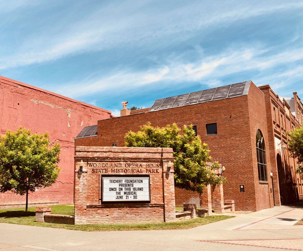 Welcome sign of Woodland Opera House