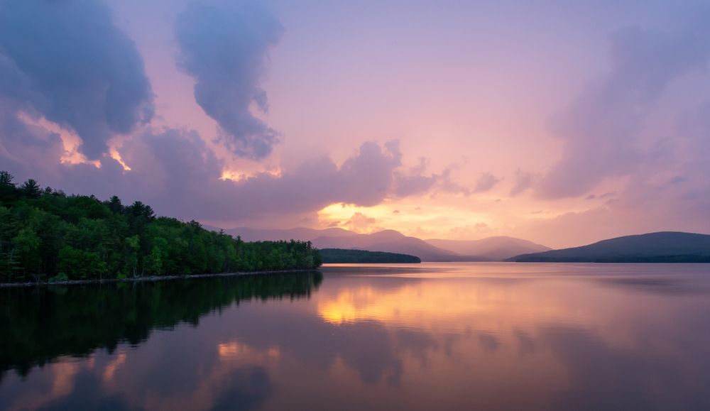 Colorful sunset reflecting on Ashokan Reservoir