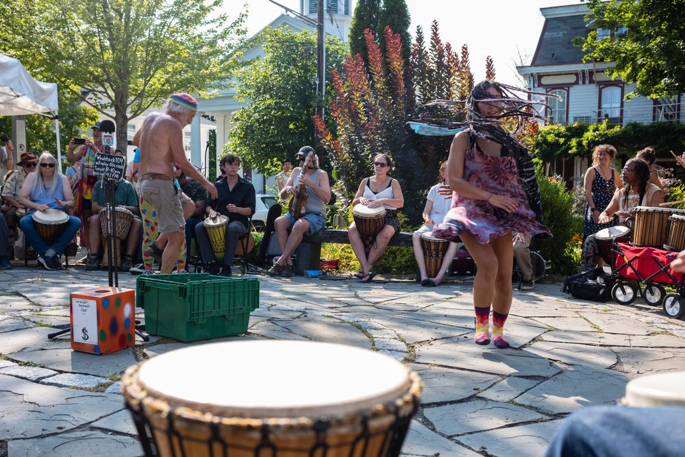 People dancing during a drum circle