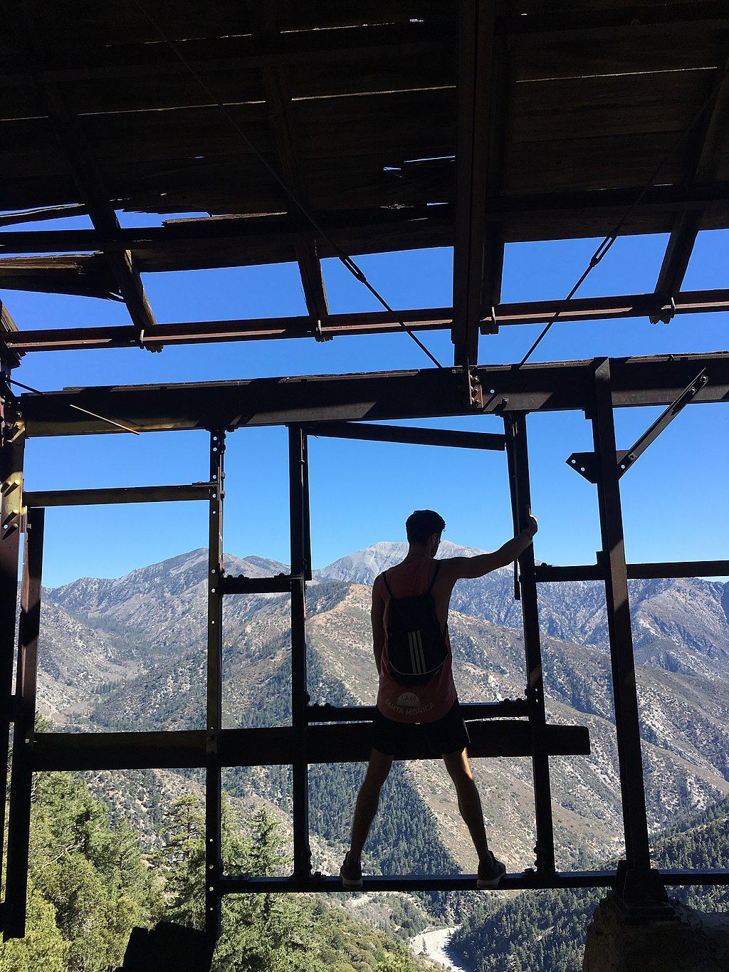 A person in Bighorn Mine Trail's abandoned house