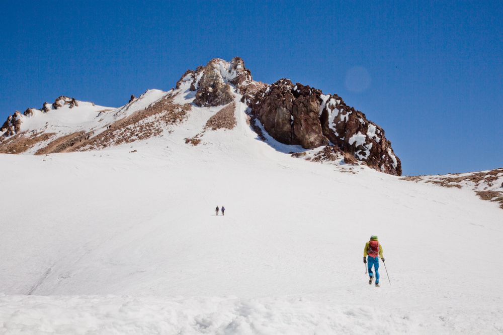 Hikers climbing the slopes of Mount Shasta