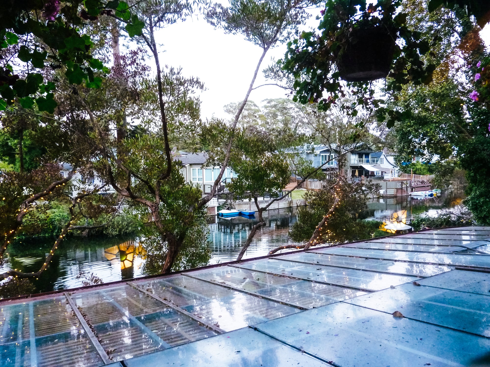 Soquel Creek seen through the glass roof of Shadowbrook Restaurant in Capitola, CA